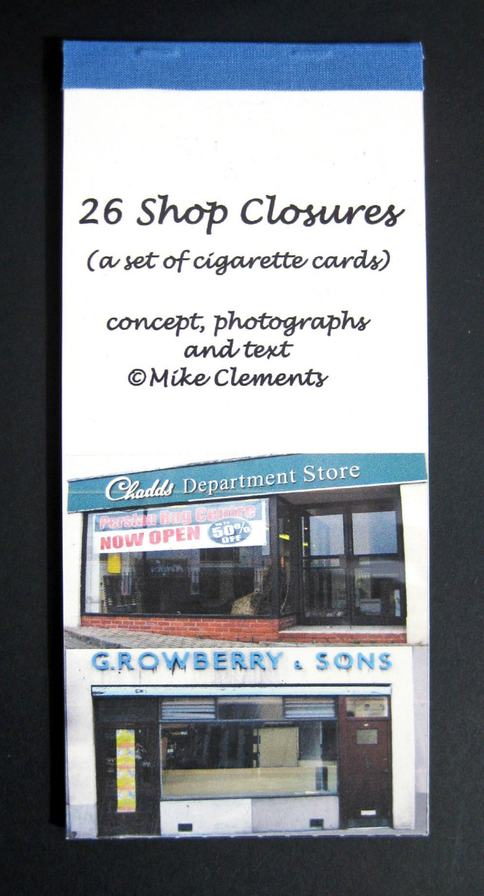 Documents the credit crunch recession of 2008 onwards through photographs of the shops that closed on one British high street. Part of a series of artists’ books on the theme of 26, conceived as a homage to American artist Ed Ruscha.
I developed the idea further by casting 26 photographs of defunct shops as contemporary cigarette cards and telling the story of a playground cigarette card game at my all boys primary school in the 1950s.
Digital print on JPP Simili Japon 225gsm paper.
9.5 x 21.0cm
£20